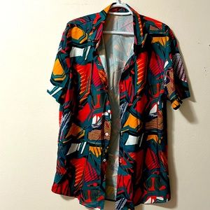 Size M printed shirt, 100% polyester material from SHEIN neverworn